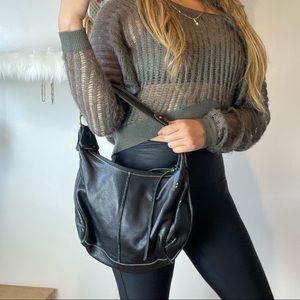 Genuine leather black hobo shoulder bag. Wilson’s leather factory.